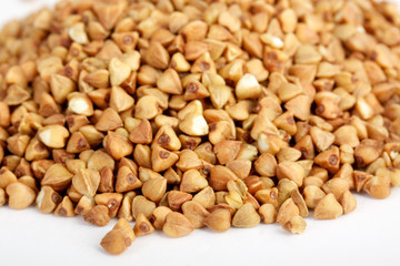 Buckwheat seeds closeup isolated on white