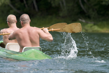 men canoeing