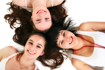 Three beautiful girls on the floor