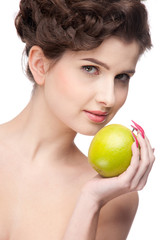 Close up portrait of beauty woman with green apple.