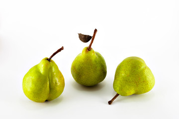 three pears isolated over white