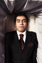 photo of a man inside a coffin