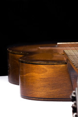 half of guitar on black and white