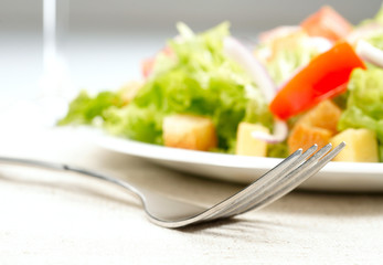 Salad on white plate
