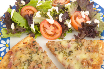 pizza and fresh vegetables