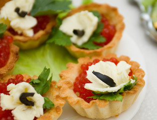 Canapes with red caviar