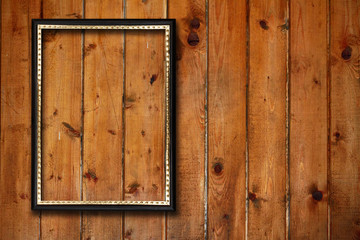Fototapeta na wymiar frame on wooden wall