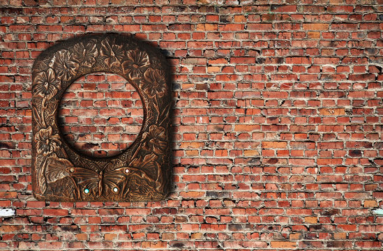 photo frame on brick wall © vlntn
