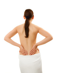 Naklejka premium Woman massaging pain back isolated on white