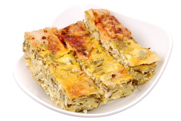 The sliced homemade pie on dish