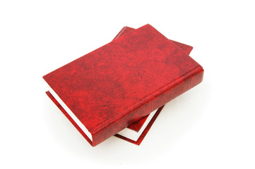 Leather-bound books isolated on the white background