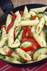 Pasta with paprika and zucchini