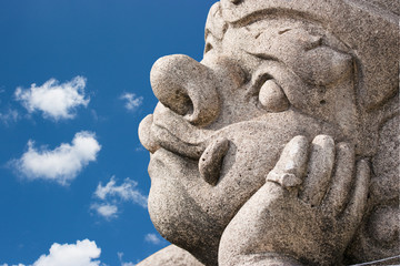 Hanuman Molding Art Looking to Blue Sky with Boring emotion