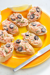 salmon tartare with capers and black olives