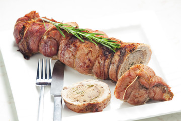 veal roll filled with minced beef meat and herbs