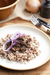 pork kidney on onion with wild rice