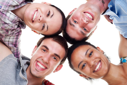 group of happy young people in circle