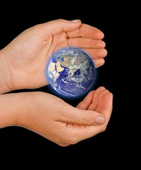 Hand with planet earth