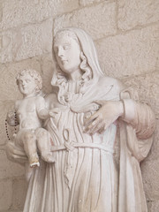 Madonna statue.