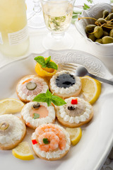variety of canapes - antipasti tartine miste