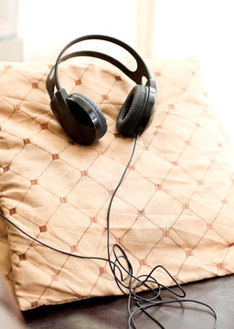 A pair of headphones lies on the floor