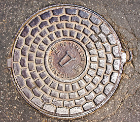 Old manhole cover
