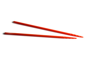 Red chopsticks isolated on white