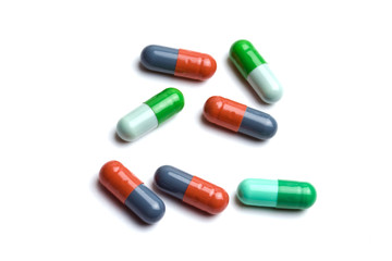 Colorful capsules isolated on white