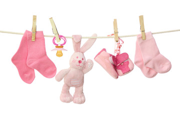 Pink baby goods hanging on the clothesline