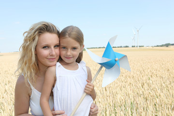 Closeup of mother and child in wheat field