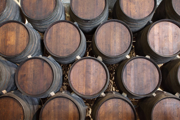 Wooden barrels in a wine cellar