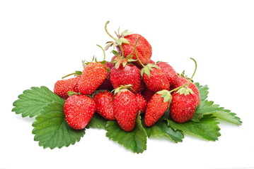 Fresh strawberry fruits with green leaves