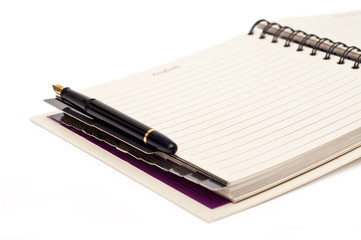 Naklejka premium organizer and pen on a white background