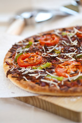 tasty pizza with tomato chesse olive