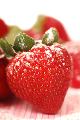 Fresh strawberry with powdered sugar