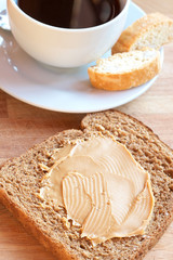 Fototapeta na wymiar Tasty healthy wholewheat bread and coffee