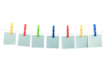seven colour cards hang on clothespins