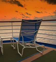 Sierkussen Caraïben Empty Lounge Chair with view of Sunset on Caribbean  © Ruth P. Peterkin