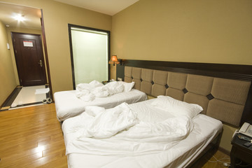 Fototapeta na wymiar Double bed in the hotel room