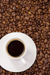 Fototapeta premium cup at coffee beans