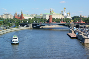 Moscow Kremlin wall and Moscow river with ship