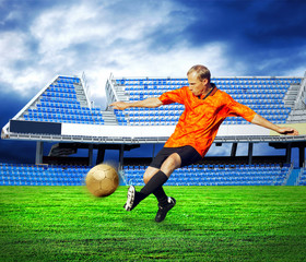 Naklejka premium Happiness football player after goal on the field of stadium und