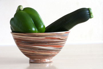 Vegetables in stripey bowl