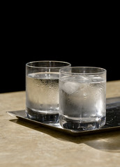two glasses of icy water
