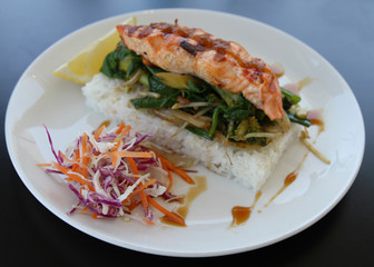 Baked salmon with herb sauce