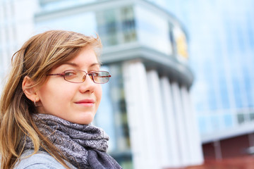 The girl on a background of a building