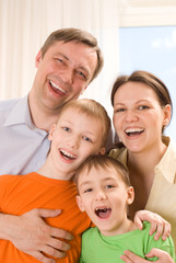 Obraz premium happy family four