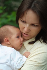 mom holds the baby