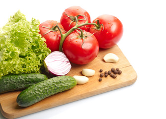 Fresh vegetables on wooden hardboard