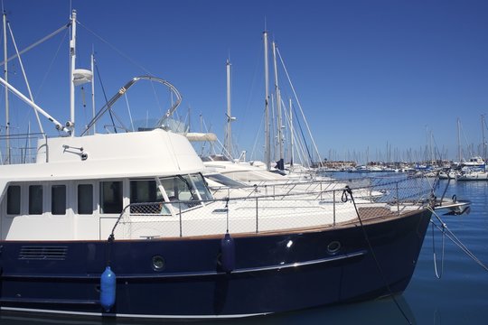 blue hull motorboat mediterranean marina
